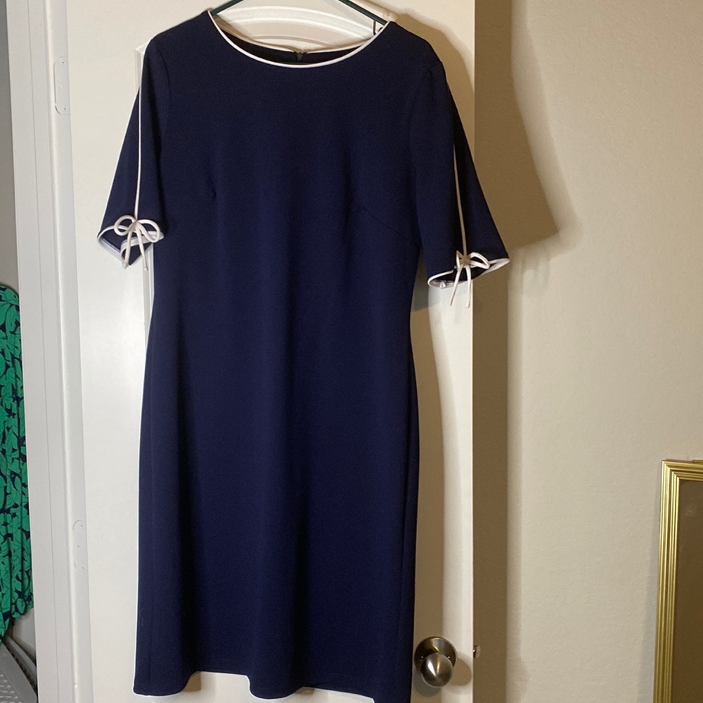 Navy blue mid-length with white trim dress